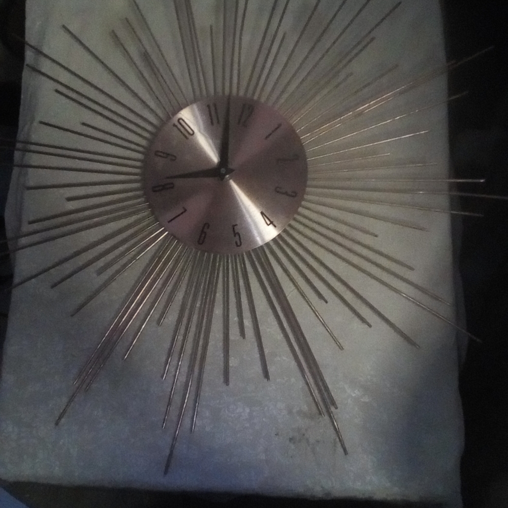 Star Spire gold colored clock